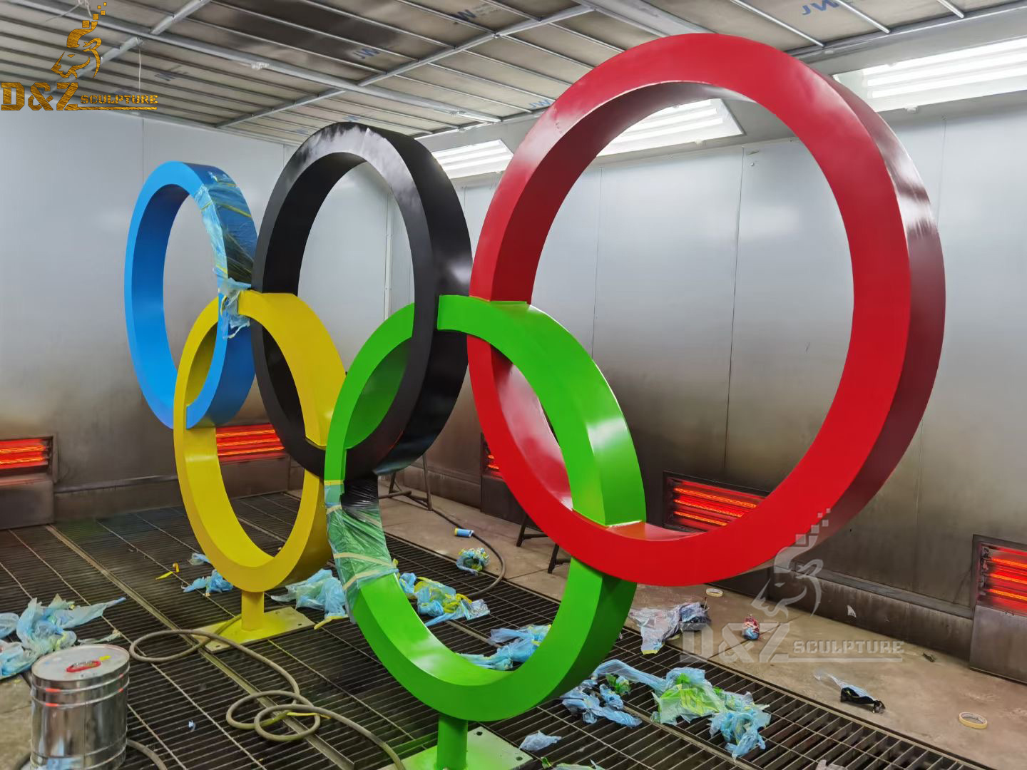The five Olympic rings are lit with fire in a pool in the Athens... News  Photo - Getty Images