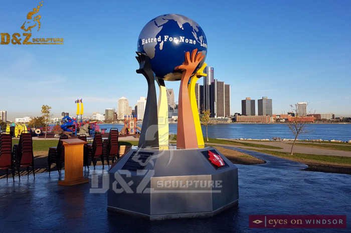 outdoor art modern world globe sculpture wilth hands world is in your hands DZM 897