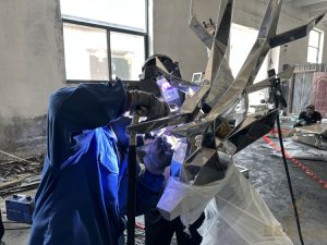 welding the stainless steel sculpture