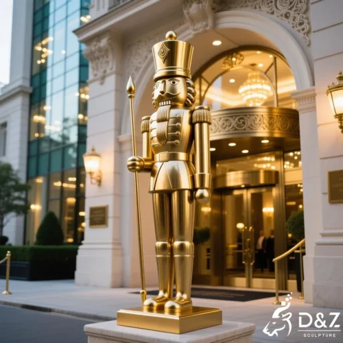 Outdoor Bronze Nutcracker Soldier Statue for Christmas DZN438 Life size bronze nutcracker soldier statue at luxury hotel entrance.