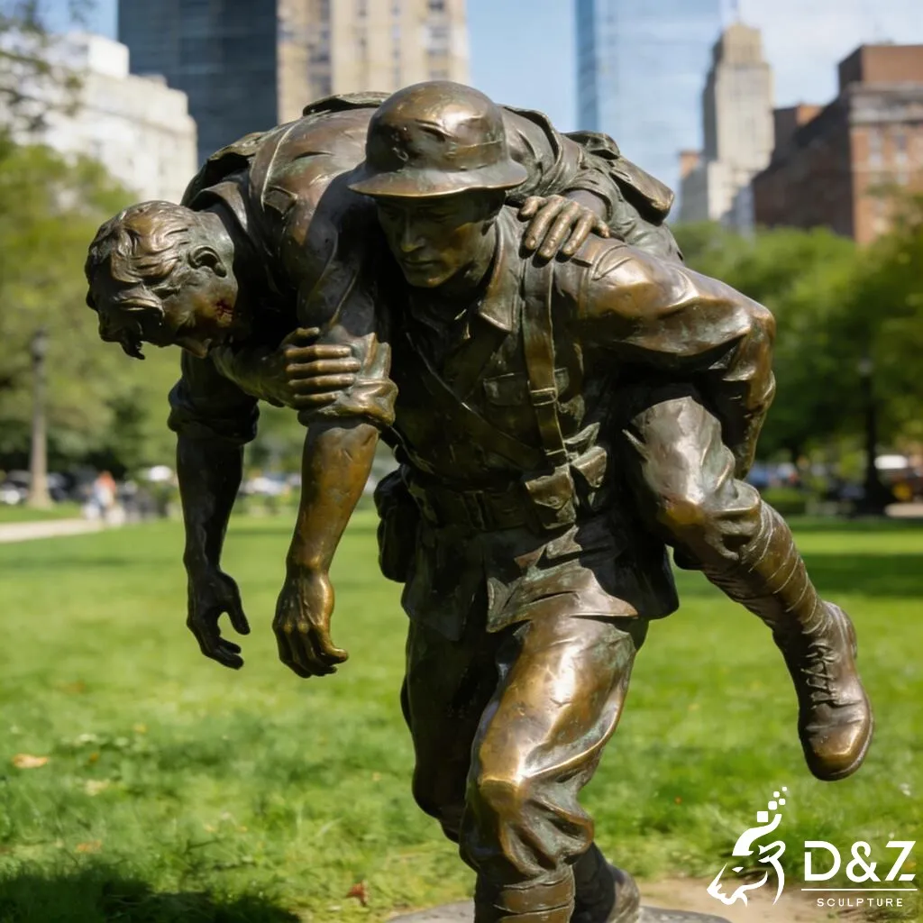 Bronze Wounded Soldier Carrying Soldier Statue for Memorial DZN439 Outdoor bronze soldier carrying soldier statue installed in a public memorial park.