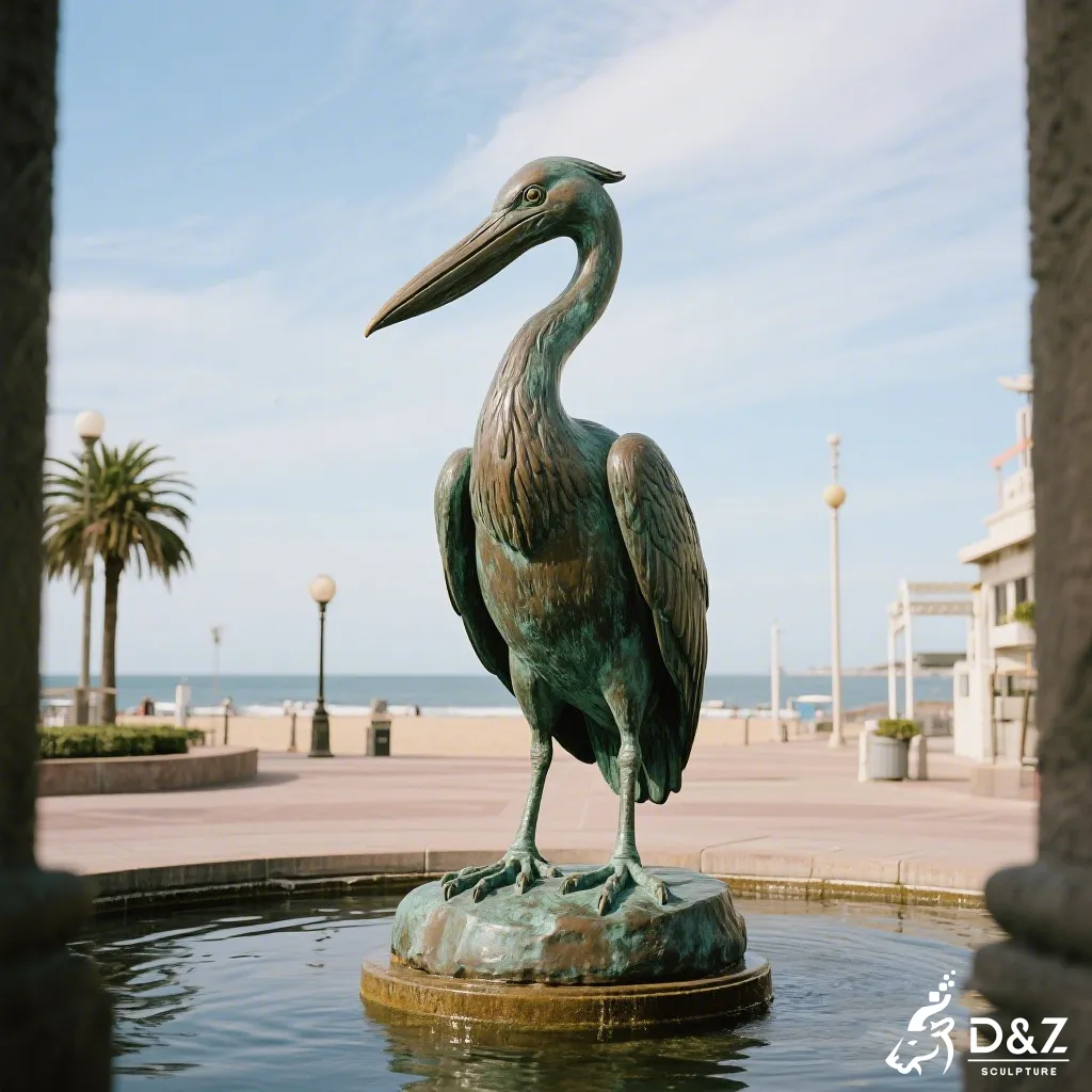 Close-up detail of handcrafted bronze pelican statue showing intricate feather textures and high-quality casting.