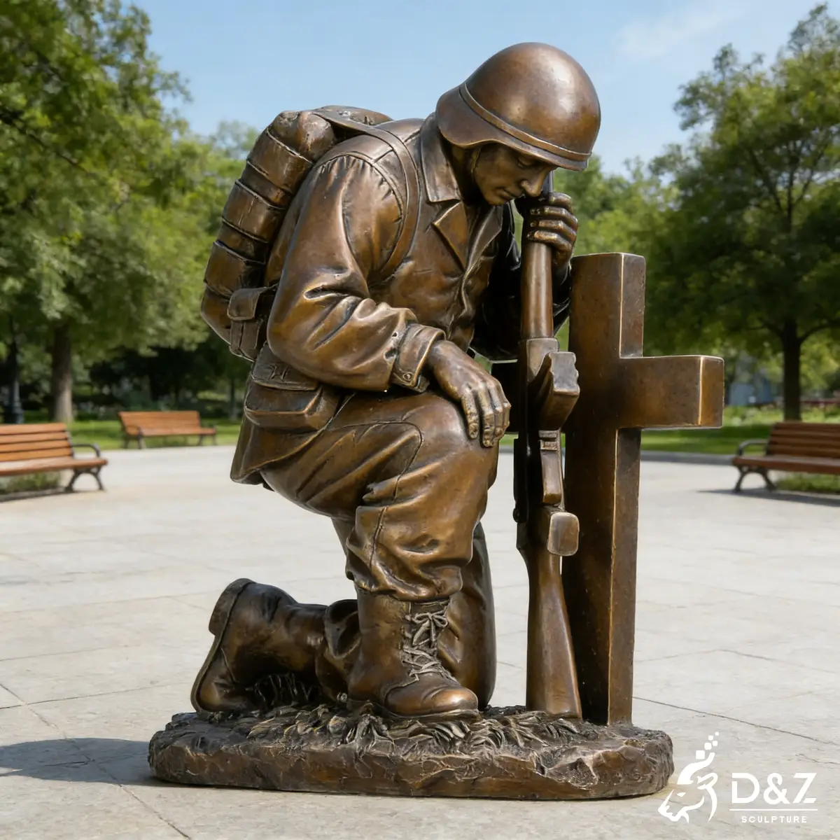 Solemn bronze kneeling and praying soldier statue at cross for memorial garden and cemetery. Solemn bronze kneeling and praying soldier statue at cross for memorial garden and cemetery.